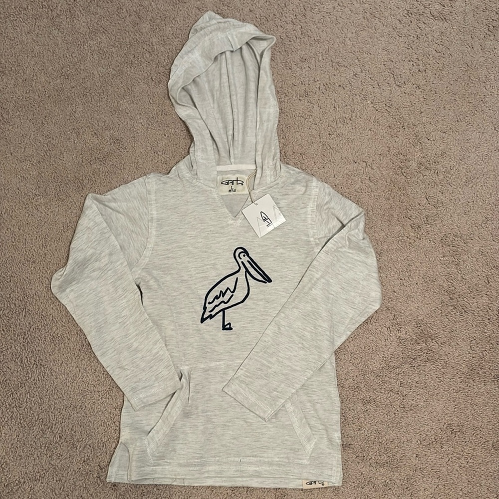 Garb brand, thin hooded long sleeve shirt with pocket.